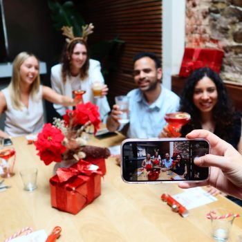 Christmas Work Party Employees taking photos